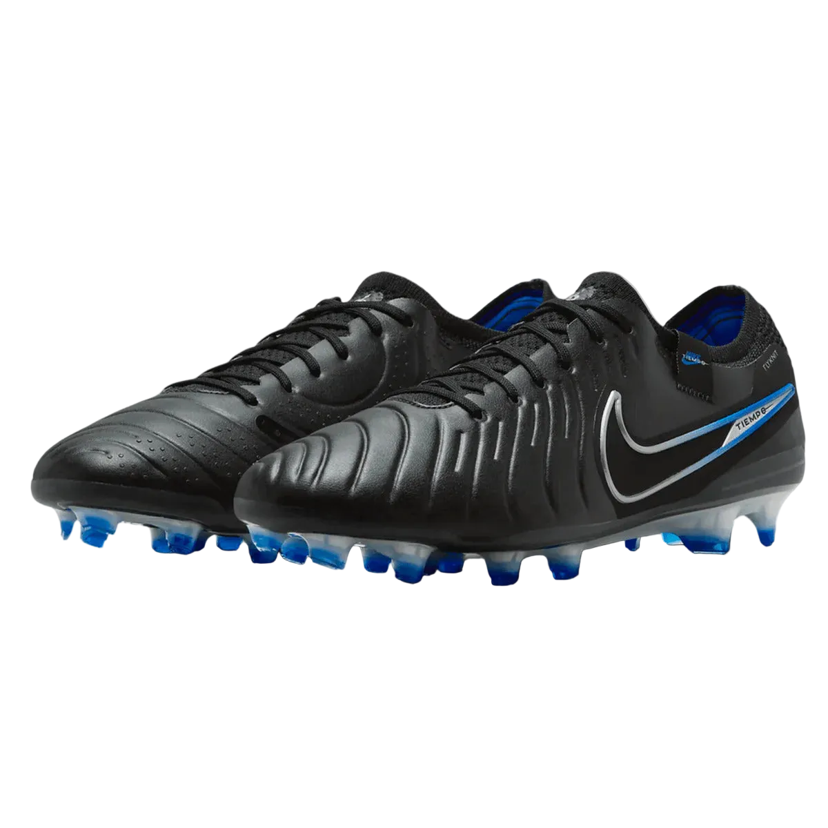 Black soccer cleats with blue soles on a white background