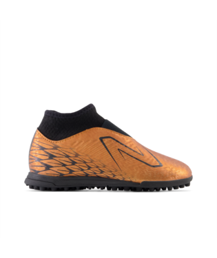 New Balance Tekela v4 Magique Junior Turf Cuivre