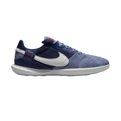 Navy blue athletic shoe with white swoosh logo on a white background