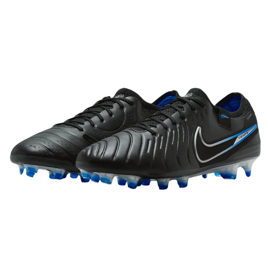 Black soccer cleats with blue soles on a white background