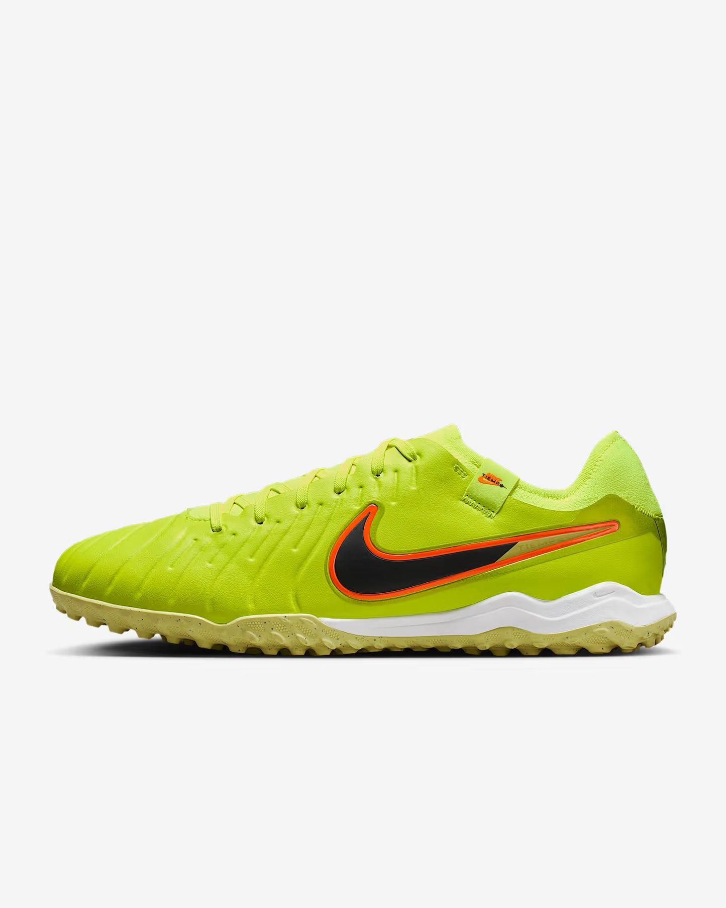 Green soccer cleat with Nike logo on a white background