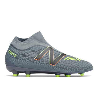 Gray soccer cleat with green accents on a white background