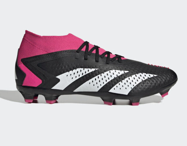 Black and pink soccer cleat on a white background